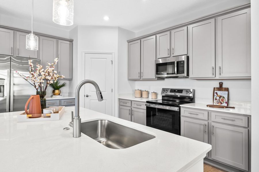 Ample storage, quartz countertops, and smart layouts. Ample storage, quartz countertops, and smart layouts.