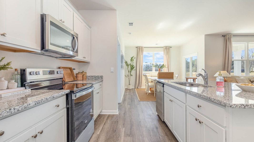 Furnished interior in a model home at Meadow Walk in Loris (Image 4).