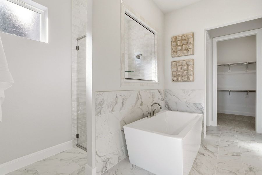 Furnished interior in a model home at Lily Creek at Sutton Fields in Aubrey (Image 53).