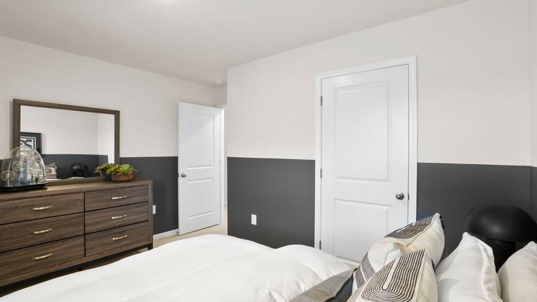 Furnished interior in a model home at Benjamin's Grove in Woodruff (Image 31).