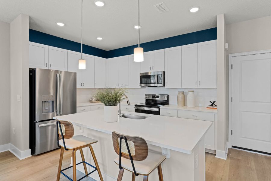 Furnished interior in a model home at Harmony Isle Townhomes in St. Cloud (Image 11). Furnished interior in a model home at Harmony Isle Townhomes in St. Cloud (Image 11).