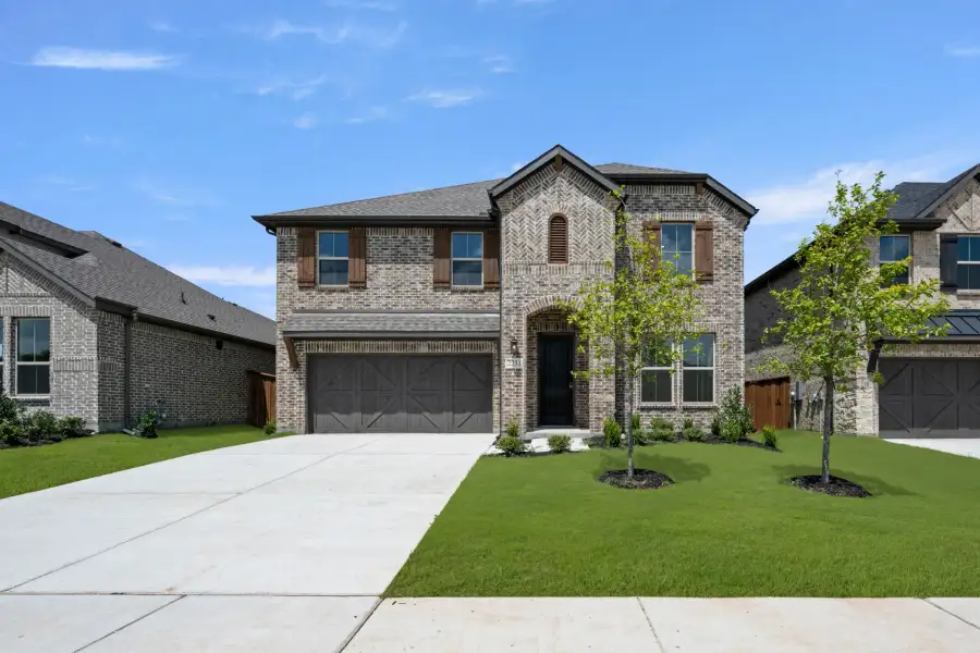 Front exterior of a home in the Discovery 50s community, located in Midlothian, TX (Image 4). Front exterior of a home in the Discovery 50s community, located in Midlothian, TX (Image 4).
