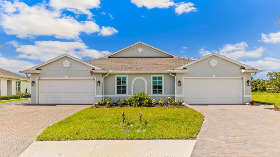 Front exterior of a home in the Sea Cove community, located in Punta Gorda, FL (Image 9).