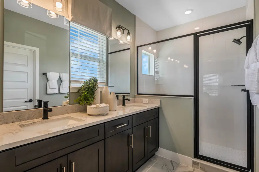 Furnished interior in a model home at Harvest at Ovation - Townhomes in Winter Garden (Image 64).
