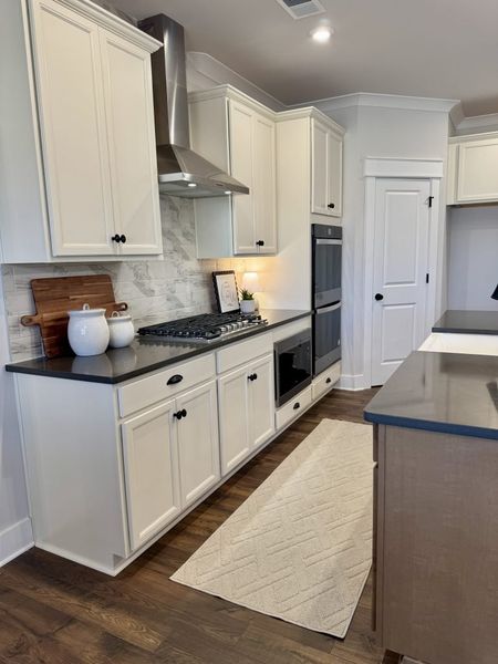 Furnished interior in a model home at Springside Reserve in Powder Springs (Image 50).