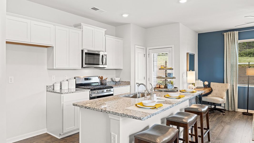 Furnished interior in a model home at The Parish at Flat Rock Townhomes in Graniteville (Image 5).