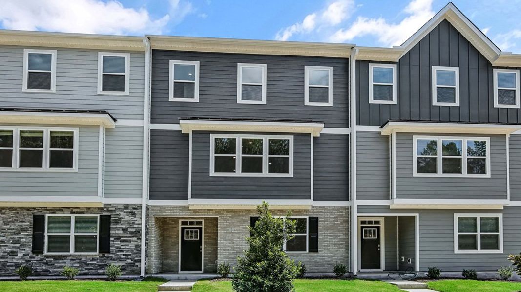 Front exterior of a home in the The Townes Park community, located in Apex, NC (Image 1). Front exterior of a home in the The Townes Park community, located in Apex, NC (Image 1).