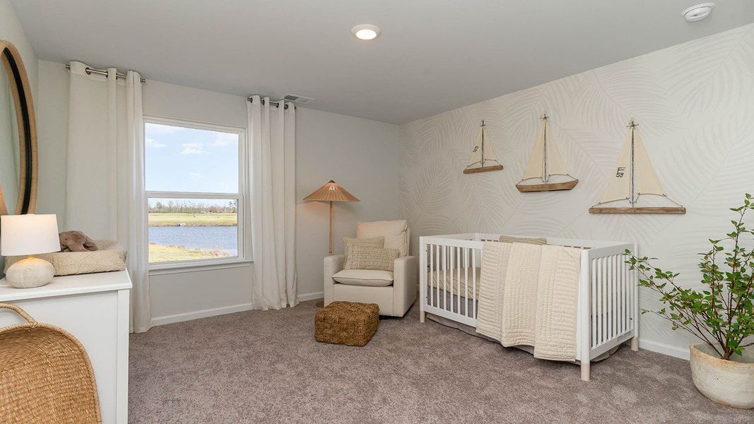 Furnished interior in a model home at South Island landing in Georgetown (Image 23).
