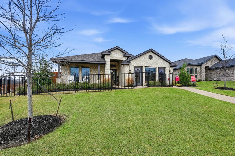 Front exterior of a home in the Trail Creek community, located in Cleburne, TX (Image 12).