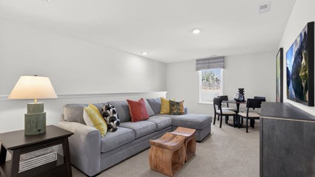 Furnished interior in a model home at The Villas at Galvins Ridge in Sanford (Image 33).