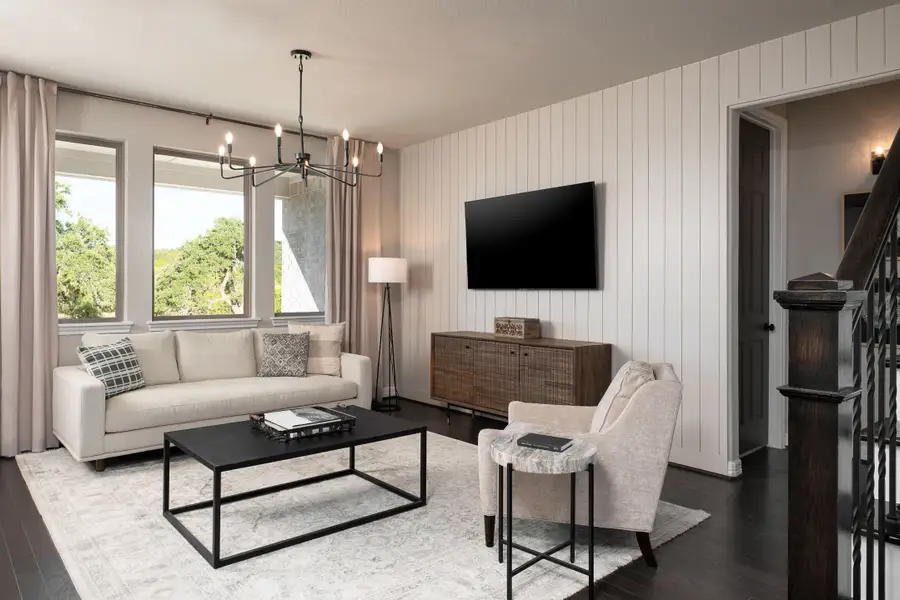 Furnished interior in a model home at Sunterra 50ft in Katy (Image 3).