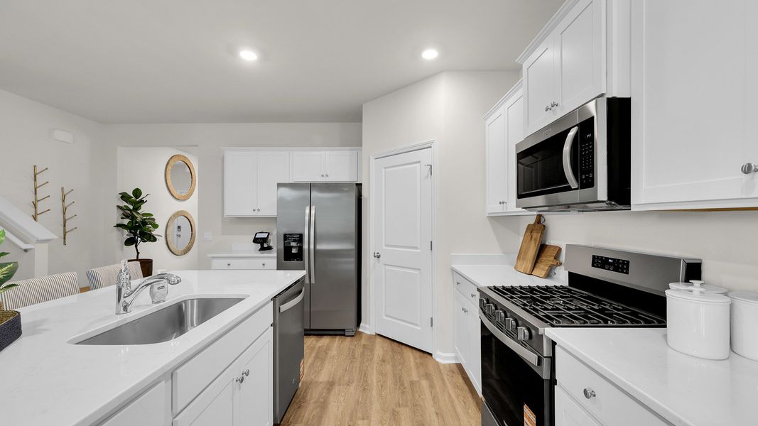 Furnished interior in a model home at The Cove at Mallard Crossing in Summerville (Image 2).