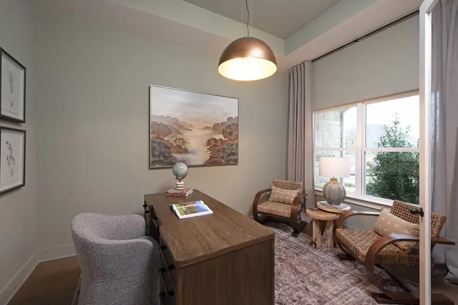 Furnished interior in a model home at Sunday Creek at Kinder Ranch in San Antonio (Image 6).