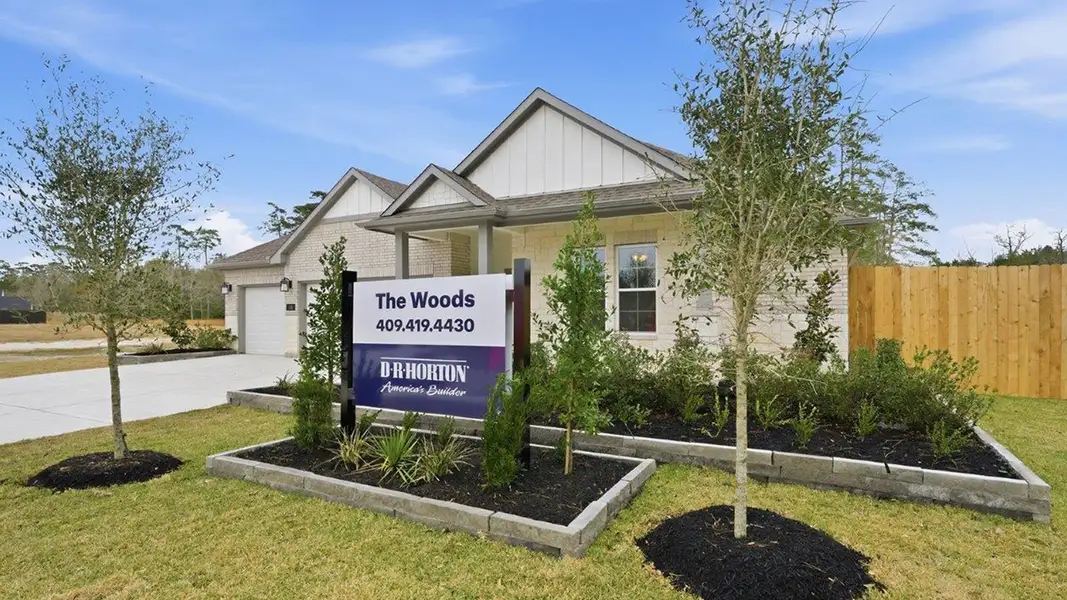 Front exterior of a home in the The Woods community, located in Lumberton, TX (Image 4).