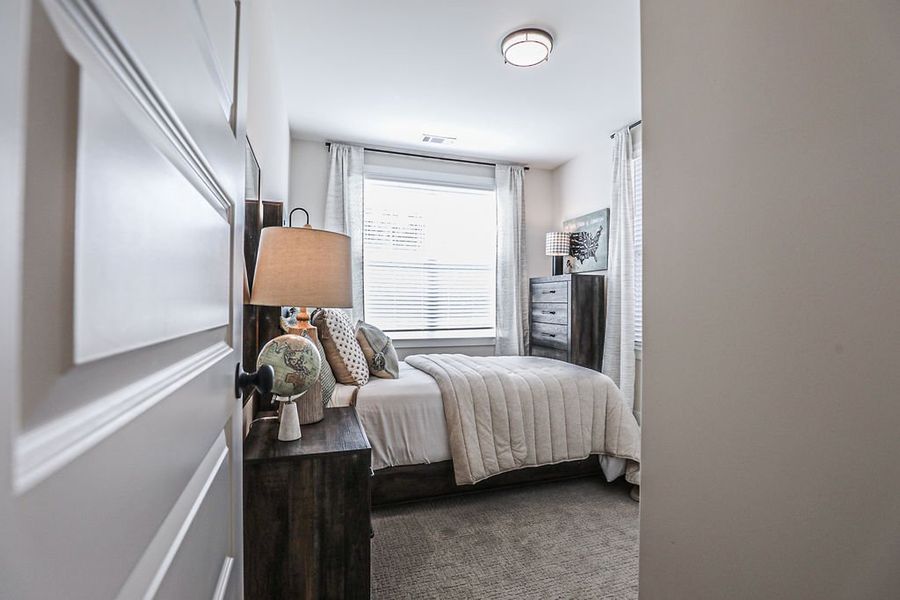 Furnished interior in a model home at Walker Farms in Bartlett (Image 34).