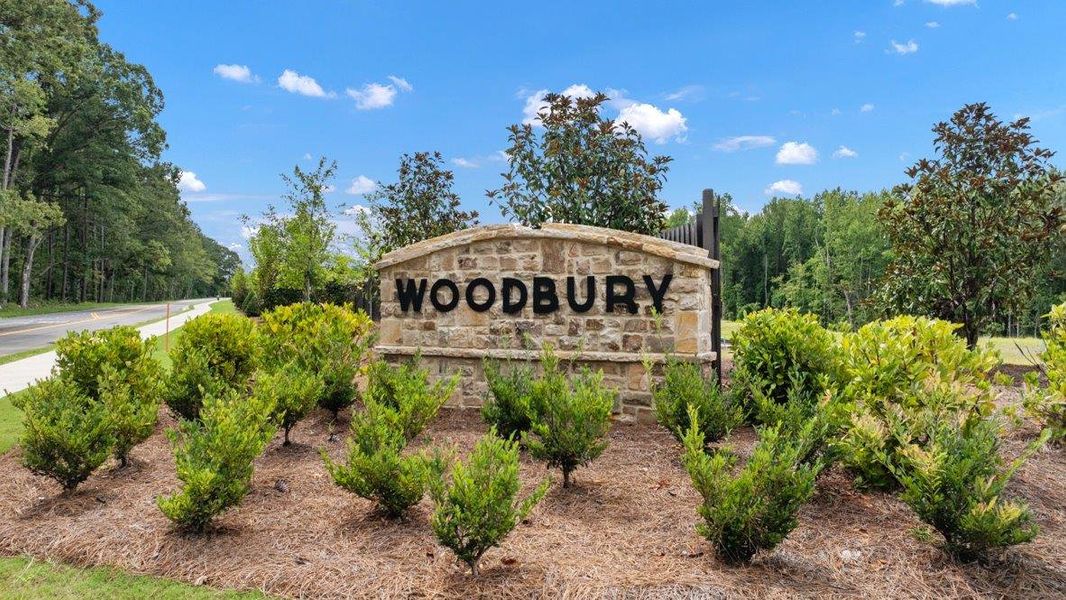 Entrance to the Woodbury Park community in Atlanta, GA, featuring signage and landscaping (Image 1).