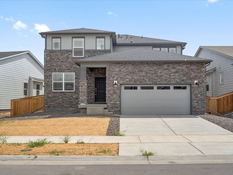 The Deercreek floorplan exterior image taken at a Meritage Homes community in Brighton, CO.