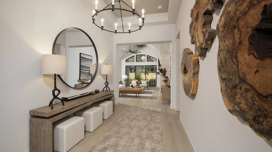 Furnished interior in a model home at The Highlands 65' in Porter (Image 6).