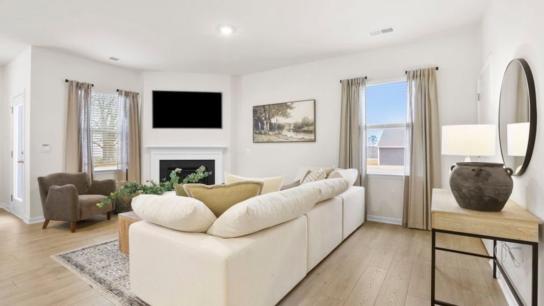 Furnished interior in a model home at Benjamin's Grove in Woodruff (Image 8).