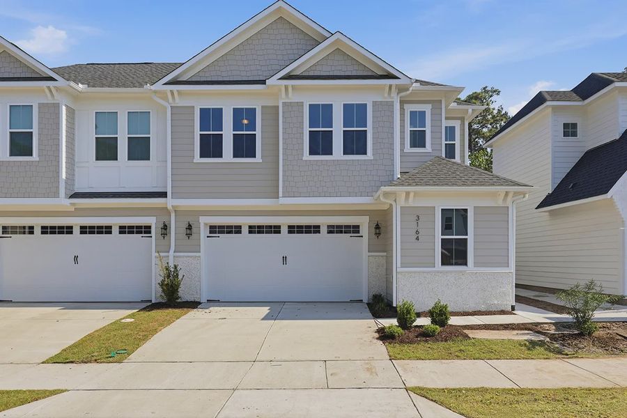 Front exterior of a home in the East & Mason community, located in Wilmington, NC (Image 22).