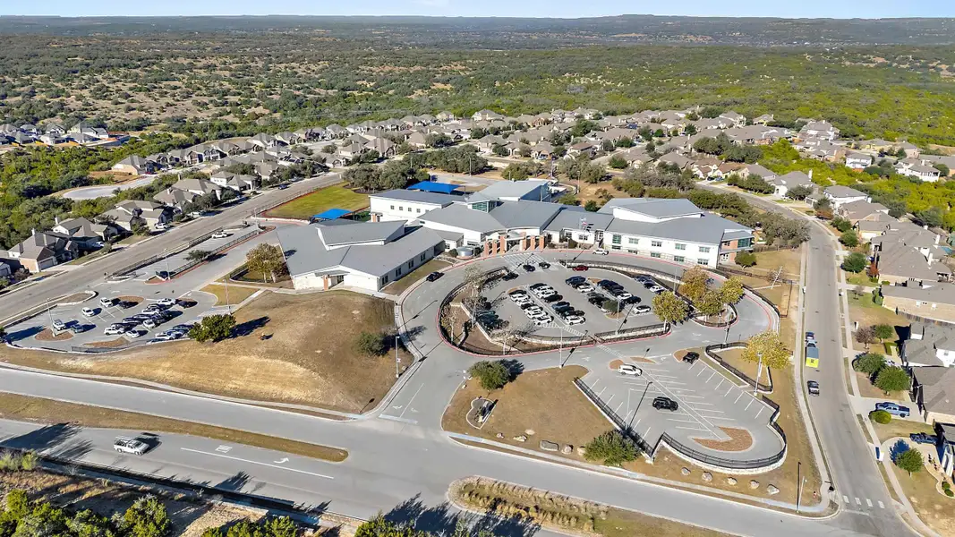 Aerial view of the Sola Vista at West Cypress Hills community in Briarcliff, TX, showing layout and nearby surroundings (Image 1). Aerial view of the Sola Vista at West Cypress Hills community in Briarcliff, TX, showing layout and nearby surroundings (Image 1).