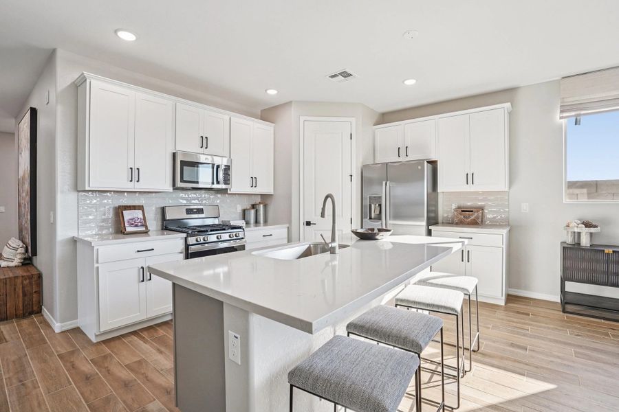 Furnished interior in a model home at Estrella Crossing in Laveen (Image 6).