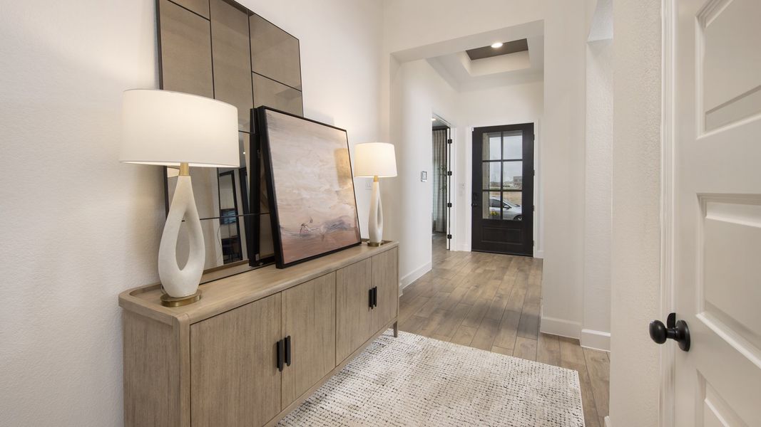 Furnished interior in a model home at Juniper Springs 50' in Lockhart (Image 4).