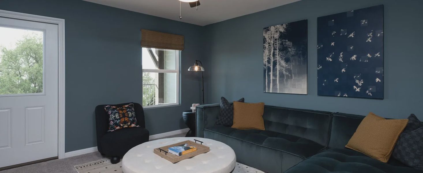 Furnished interior in a model home at Covered Bridge in Hutto (Image 28).