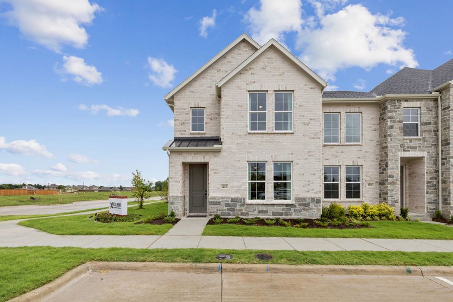 Front exterior of a home in the Twin Creeks Watters community, located in Allen, TX (Image 12).