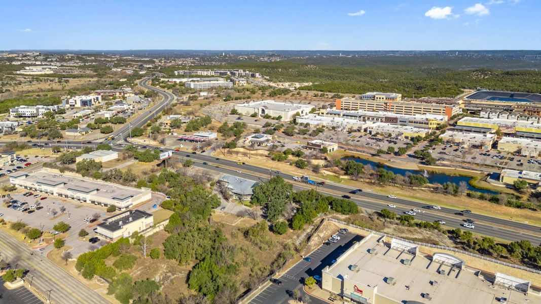 Aerial view of the Sola Vista at West Cypress Hills community in Briarcliff, TX, showing layout and nearby surroundings (Image 12). Aerial view of the Sola Vista at West Cypress Hills community in Briarcliff, TX, showing layout and nearby surroundings (Image 12).