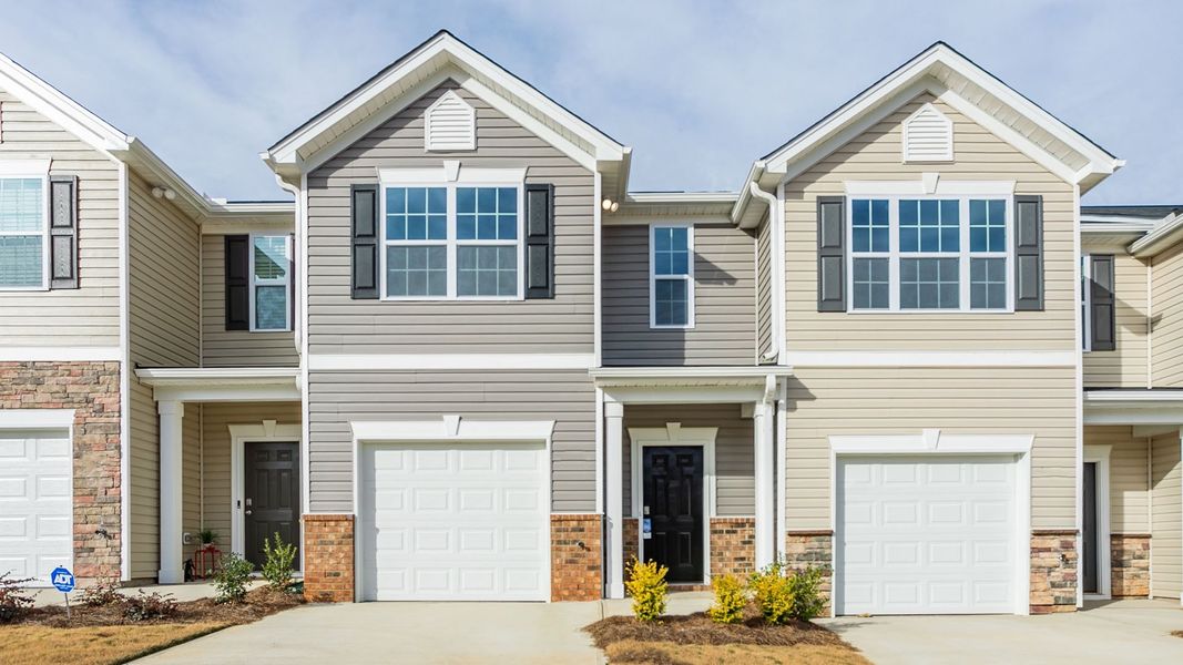 Front exterior of a home in the The Townes at Riley's Meadow community, located in Haw River, NC (Image 1).