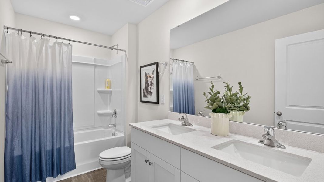 Furnished interior in a model home at Belle Grove in Wendell (Image 40).