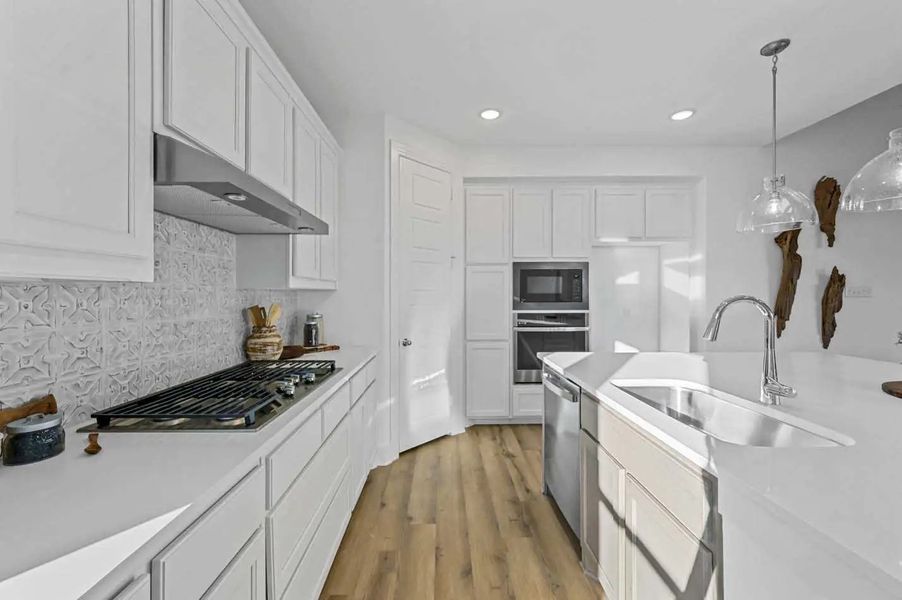 Furnished interior in a model home at Mantua Point: 40ft. lots in Van Alstyne (Image 22).