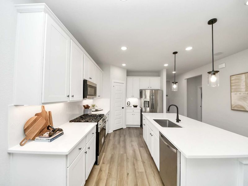 Furnished interior in a model home at Enclave at Newport in Crosby (Image 26).