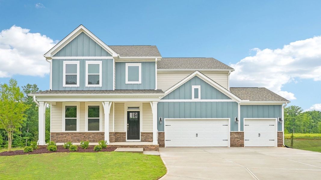 Front exterior of a home in the The Manors at Winston Pointe community, located in Clayton, NC (Image 4). Front exterior of a home in the The Manors at Winston Pointe community, located in Clayton, NC (Image 4).