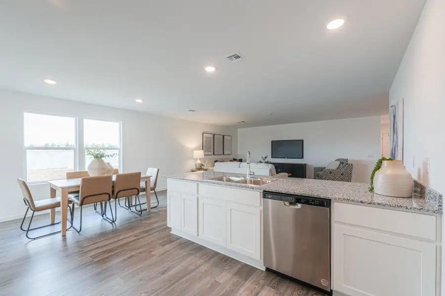A kitchen with a large island. A kitchen with a large island.