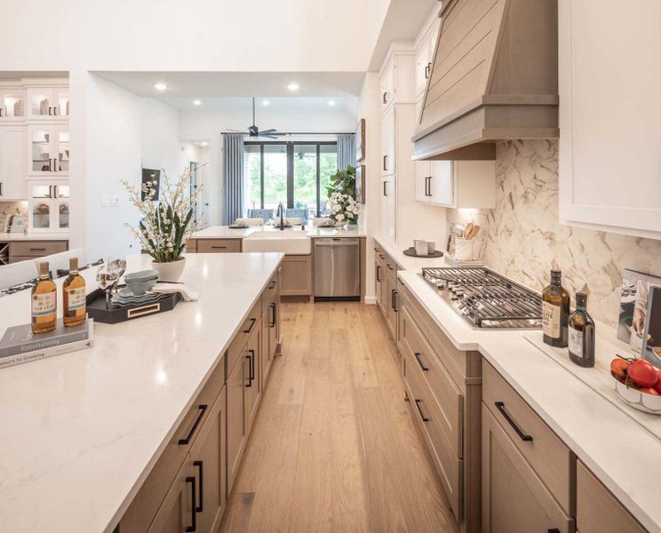 Furnished interior in a model home at Fulbrook on Fulshear Creek: 60ft. lots in Fulshear (Image 8).