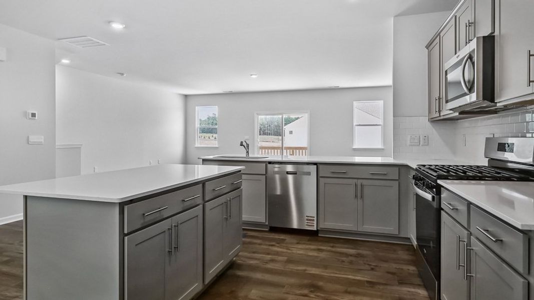 Furnished interior in a model home at The Townes Park in Apex (Image 4). Furnished interior in a model home at The Townes Park in Apex (Image 4).