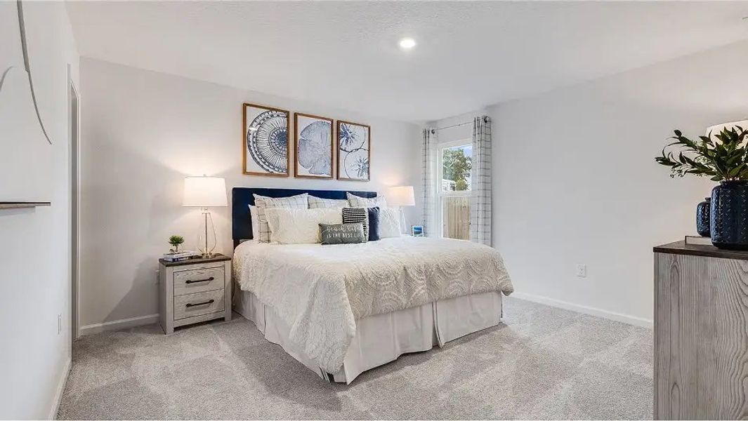 Furnished interior in a model home at Eagle's Ridge: Watermill in Pace (Image 3).