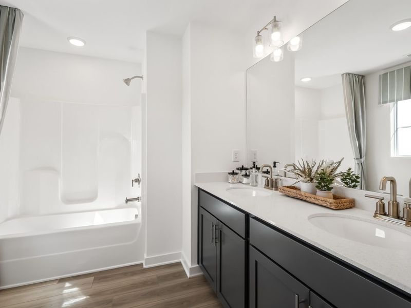 Furnished interior in a model home at The Towns at Red River in Gallatin (Image 15).