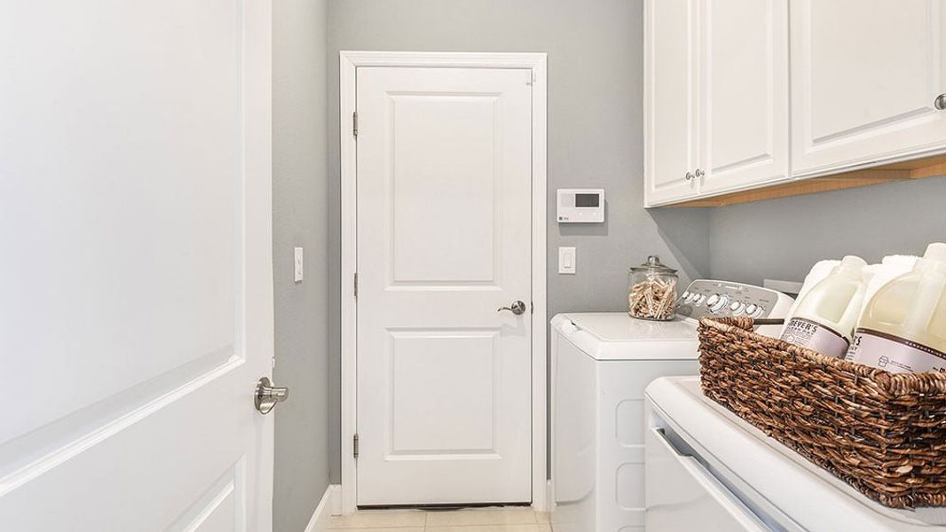 Furnished interior in a model home at Cassia at Skye Ranch in Sarasota (Image 60).