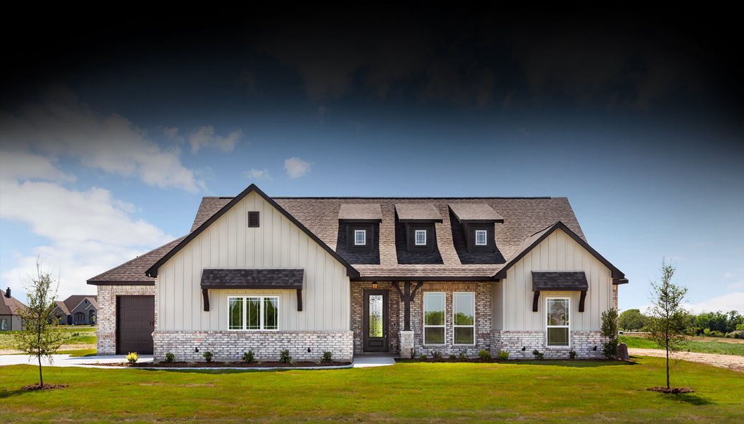 Front exterior of a home in the Summit Ranch community, located in Aledo, TX (Image 12).