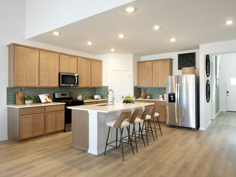 Furnished interior in a model home at Prairie Winds - Boulevard Collection in Hutto (Image 6). Furnished interior in a model home at Prairie Winds - Boulevard Collection in Hutto (Image 6).