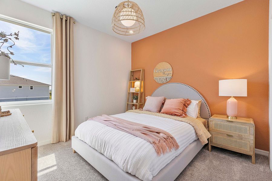 Furnished interior in a model home at The Sanctuary – Coastal Collection in Punta Gorda (Image 28).