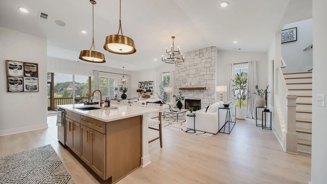 Experience sophistication with elegant fixtures and a stunning stone fireplace in Shelton Square, enhancing every moment.