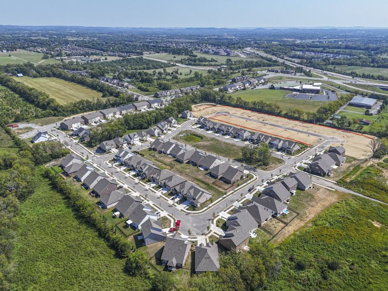 Aerial view of the Kensington Downs Single Family community in Gallatin, TN, showing layout and nearby surroundings (Image 13). Aerial view of the Kensington Downs Single Family community in Gallatin, TN, showing layout and nearby surroundings (Image 13).