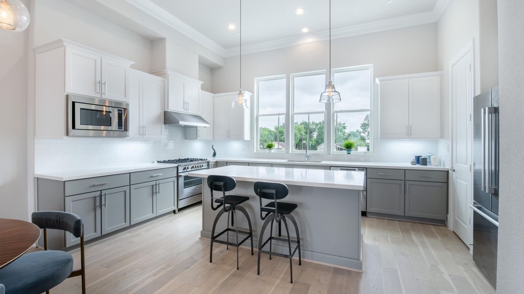 Furnished interior in a model home at Upper East River in Houston (Image 4).