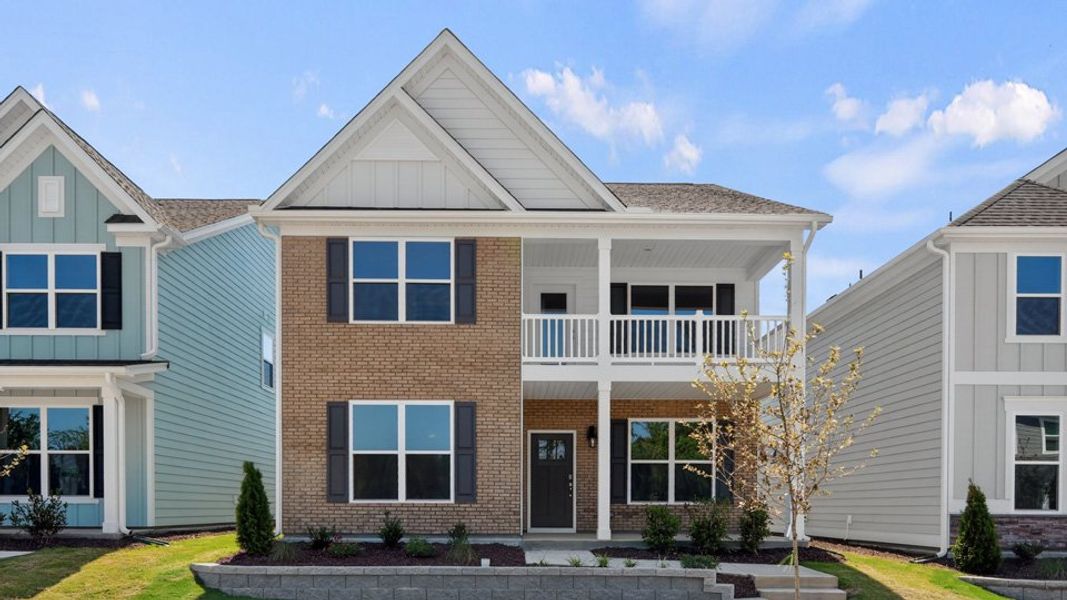 Front exterior of a home in the Madden West community, located in Fuquay Varina, NC (Image 21). Front exterior of a home in the Madden West community, located in Fuquay Varina, NC (Image 21).