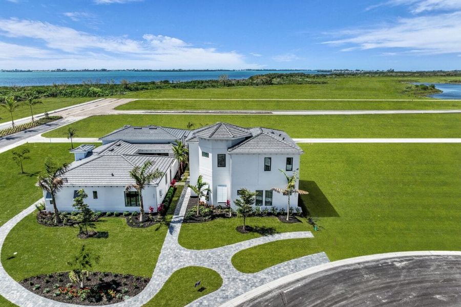 Front exterior of a home in the Aqua community, located in Bradenton, FL (Image 52).