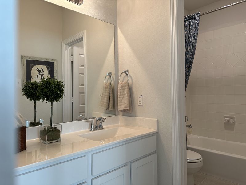 Furnished interior in a model home at Trails at Woodhaven Lakes in La Marque (Image 18).